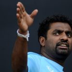 Sri Lanka’s Muttiah Muralitharan gestures during a training session at the Wankhede Stadium in Mumbai