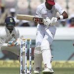 Roston Chase and Jason Holder batting against India